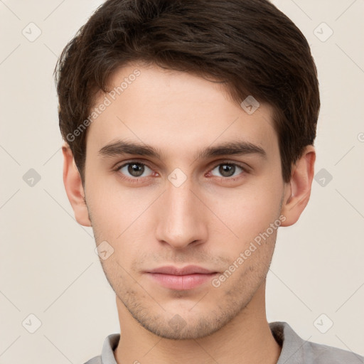 Neutral white young-adult male with short  brown hair and brown eyes