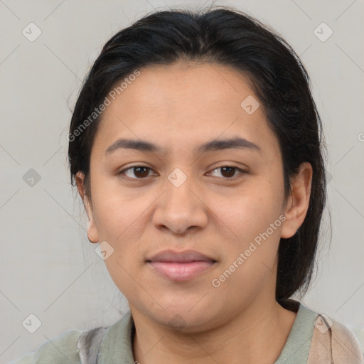Joyful latino young-adult female with medium  brown hair and brown eyes