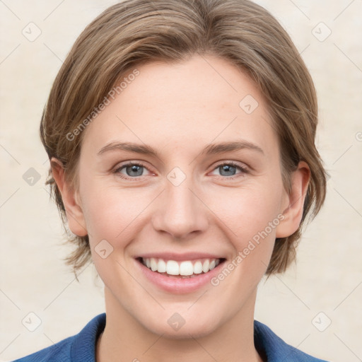 Joyful white young-adult female with medium  brown hair and blue eyes