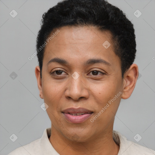 Joyful latino adult female with short  black hair and brown eyes