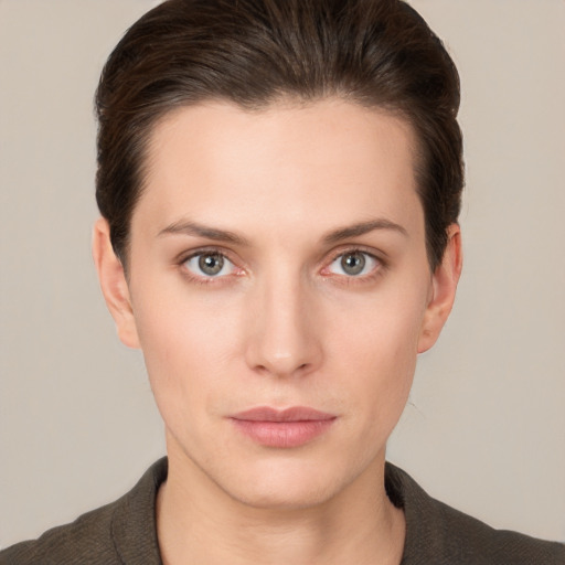 Neutral white young-adult female with short  brown hair and brown eyes