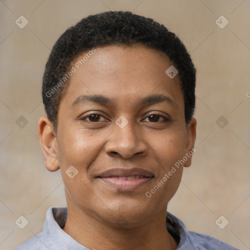 Joyful black young-adult male with short  brown hair and brown eyes