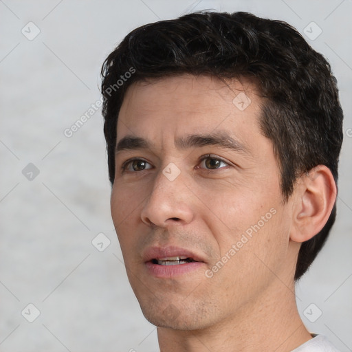 Neutral white adult male with short  brown hair and brown eyes