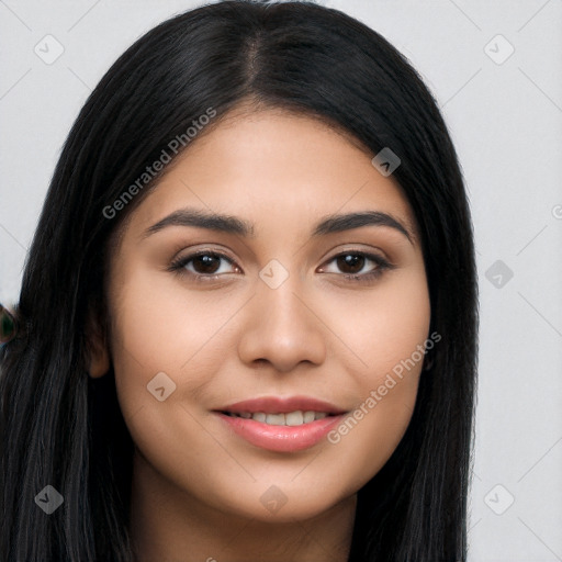 Joyful latino young-adult female with long  black hair and brown eyes