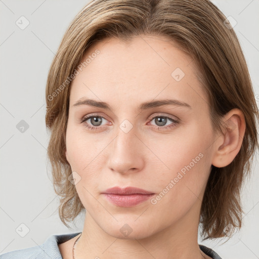 Neutral white young-adult female with medium  brown hair and grey eyes