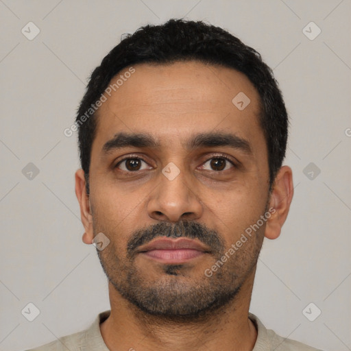 Neutral latino young-adult male with short  black hair and brown eyes