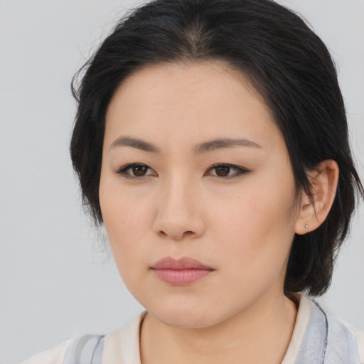 Neutral asian young-adult female with medium  brown hair and brown eyes