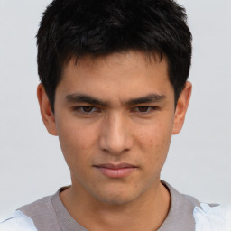 Neutral asian young-adult male with short  brown hair and brown eyes