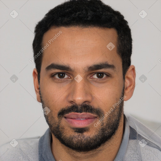 Neutral latino young-adult male with short  black hair and brown eyes