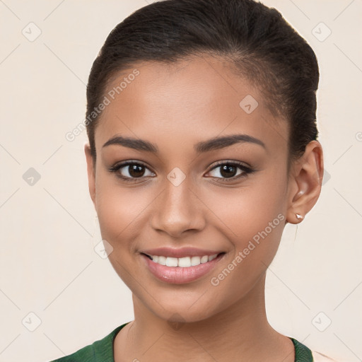 Joyful white young-adult female with short  brown hair and brown eyes