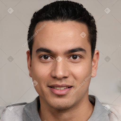 Joyful white young-adult male with short  black hair and brown eyes