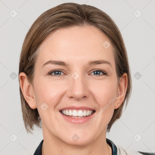 Joyful white young-adult female with medium  brown hair and grey eyes