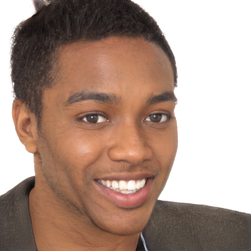 Joyful black young-adult male with short  brown hair and brown eyes