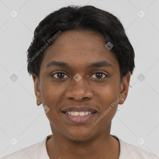 Joyful black young-adult female with short  black hair and brown eyes