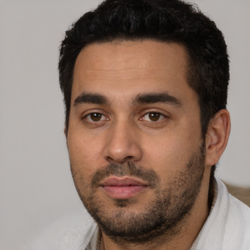 Neutral latino young-adult male with short  black hair and brown eyes
