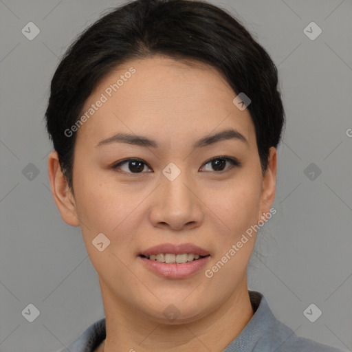 Joyful asian young-adult female with short  black hair and brown eyes