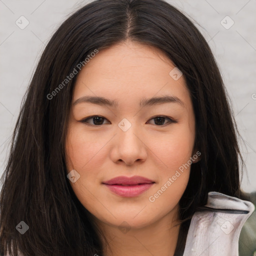 Joyful asian young-adult female with long  brown hair and brown eyes