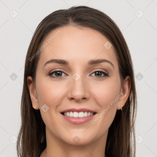 Joyful white young-adult female with long  brown hair and grey eyes