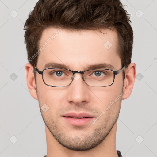 Neutral white young-adult male with short  brown hair and grey eyes