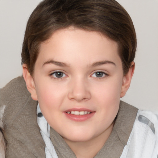 Joyful white child female with short  brown hair and brown eyes