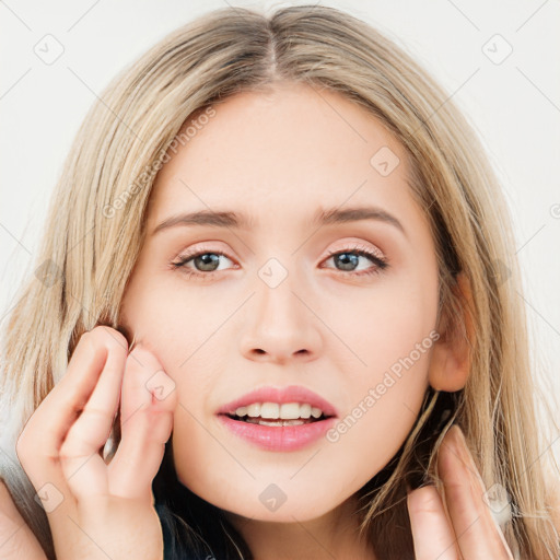 Joyful white young-adult female with long  brown hair and blue eyes