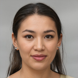 Joyful white young-adult female with medium  brown hair and brown eyes