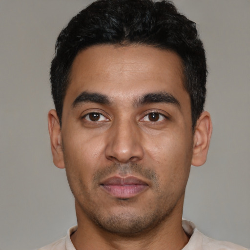 Neutral latino young-adult male with short  black hair and brown eyes