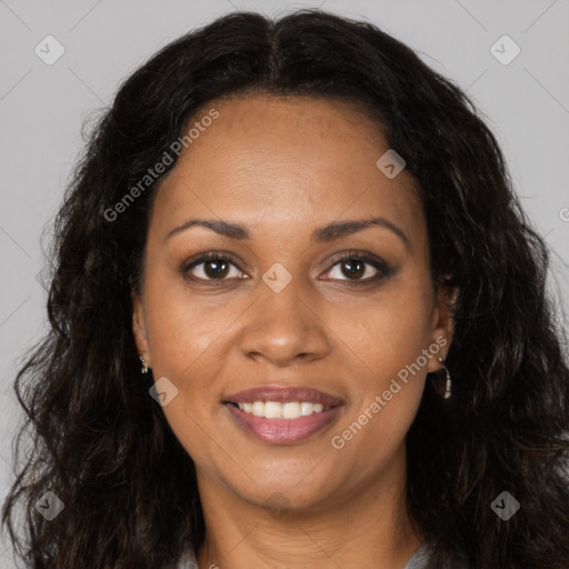 Joyful black young-adult female with long  brown hair and brown eyes