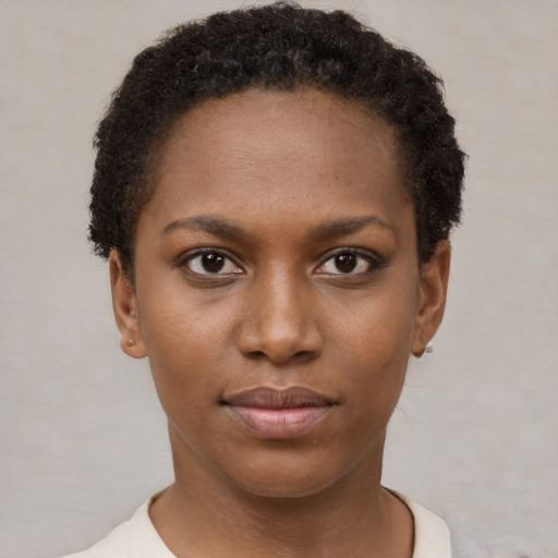 Neutral black young-adult female with short  brown hair and brown eyes