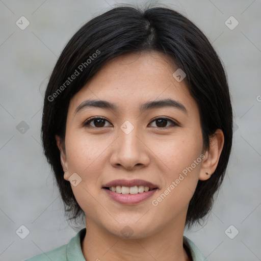 Joyful asian young-adult female with medium  black hair and brown eyes