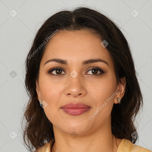 Joyful latino young-adult female with medium  brown hair and brown eyes