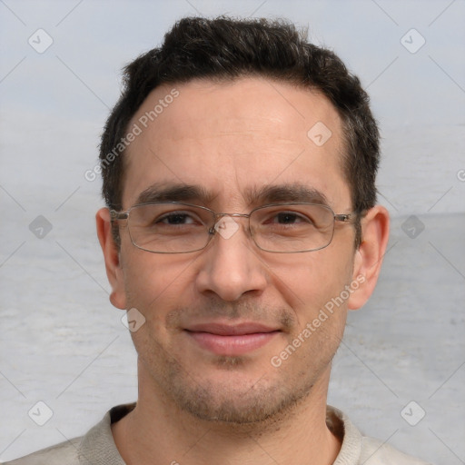 Joyful white adult male with short  brown hair and brown eyes