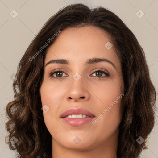 Joyful white young-adult female with long  brown hair and brown eyes