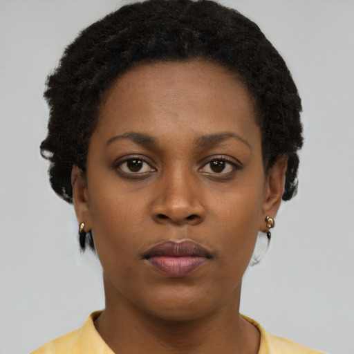 Neutral black young-adult female with short  brown hair and brown eyes