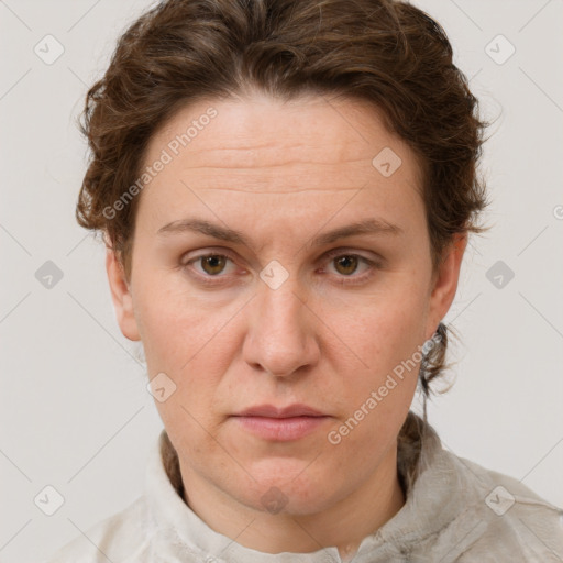 Joyful white adult female with short  brown hair and grey eyes