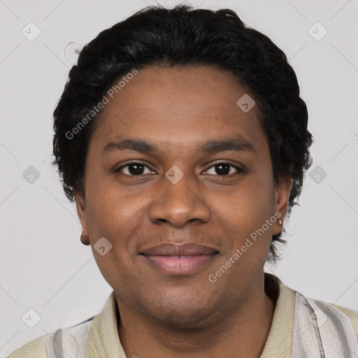 Joyful black young-adult male with short  black hair and brown eyes