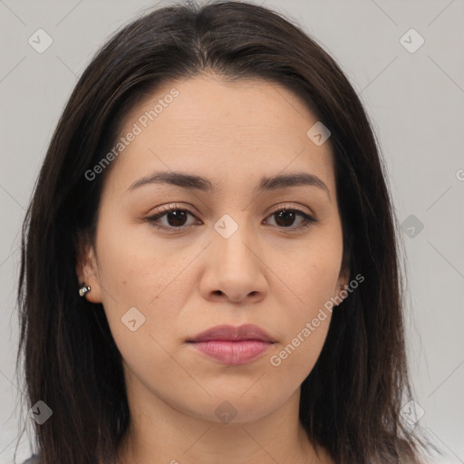 Joyful asian young-adult female with long  brown hair and brown eyes