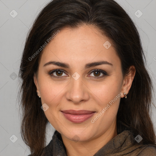 Joyful white adult female with medium  brown hair and brown eyes