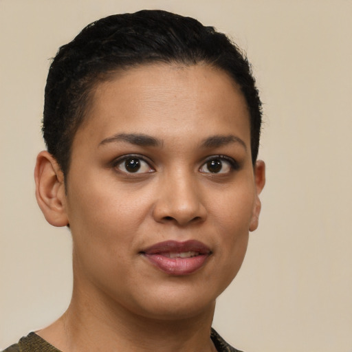 Joyful latino young-adult female with short  brown hair and brown eyes