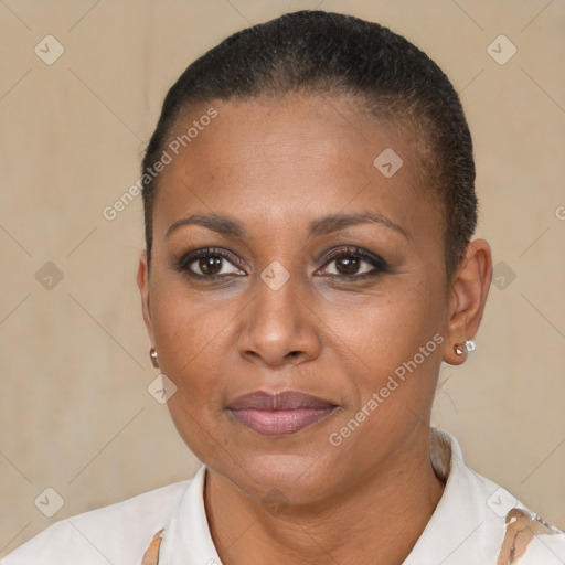 Joyful black young-adult female with short  brown hair and brown eyes