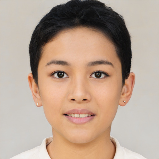Joyful asian young-adult female with short  black hair and brown eyes