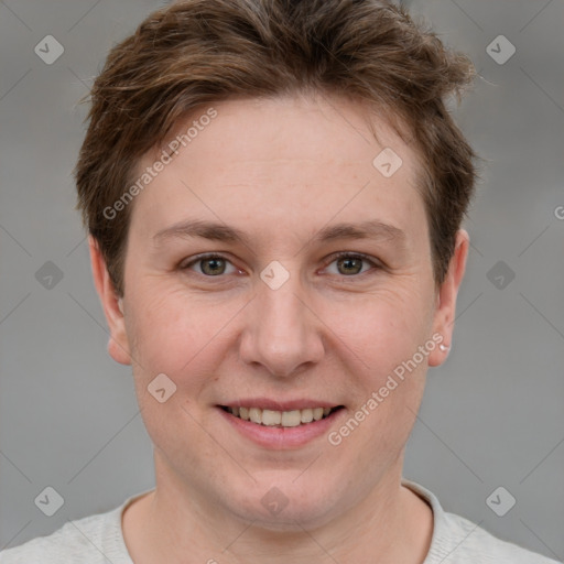 Joyful white young-adult female with short  brown hair and grey eyes