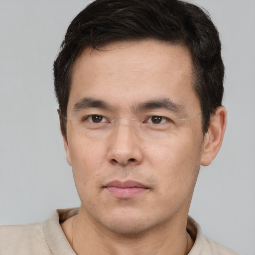 Neutral white young-adult male with short  black hair and brown eyes
