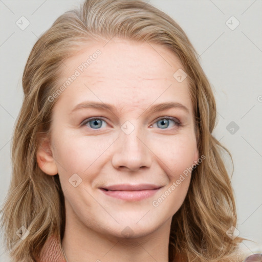 Joyful white young-adult female with long  brown hair and blue eyes