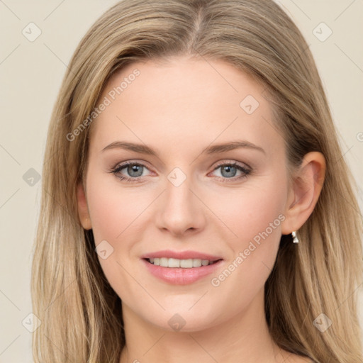 Joyful white young-adult female with long  brown hair and green eyes