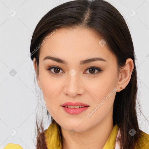 Joyful asian young-adult female with long  brown hair and brown eyes