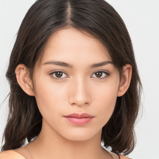 Neutral asian young-adult female with medium  brown hair and brown eyes