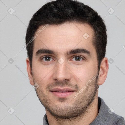 Neutral white young-adult male with short  brown hair and brown eyes