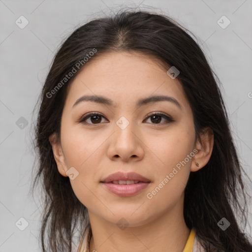 Joyful asian young-adult female with long  brown hair and brown eyes