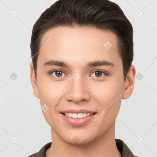 Joyful white young-adult male with short  brown hair and brown eyes